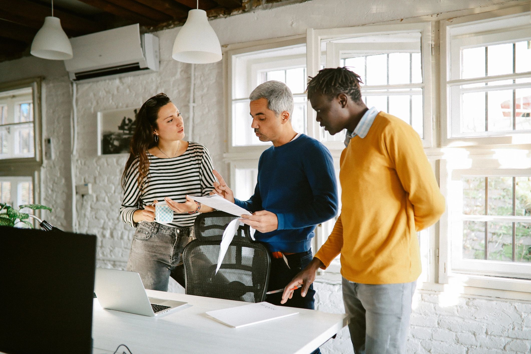Team collaborating in a modern workspace